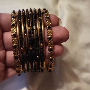 Beautiful Gold and Black bracelets. Louisa Indian style bangles.
